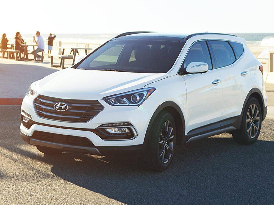 HYUNDAI SANTA FE 2017 5XYZWDLA1HG4G7799 image